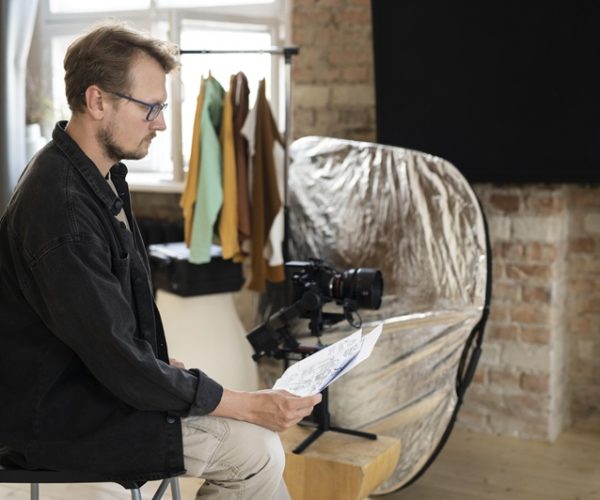 male director looking script his new movie